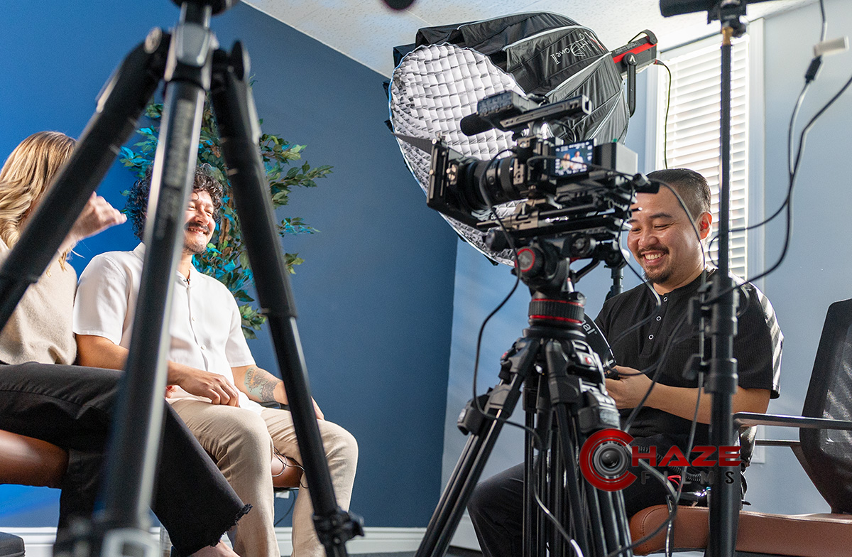 Behind-the-scenes on a Boston video production set filming and interviewing for client testimonial videos